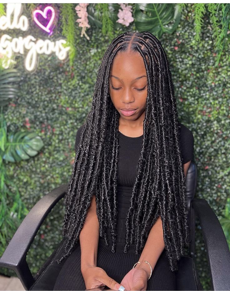 Soft Locks hairstyle at Kani African Hair Braiding in Cleveland